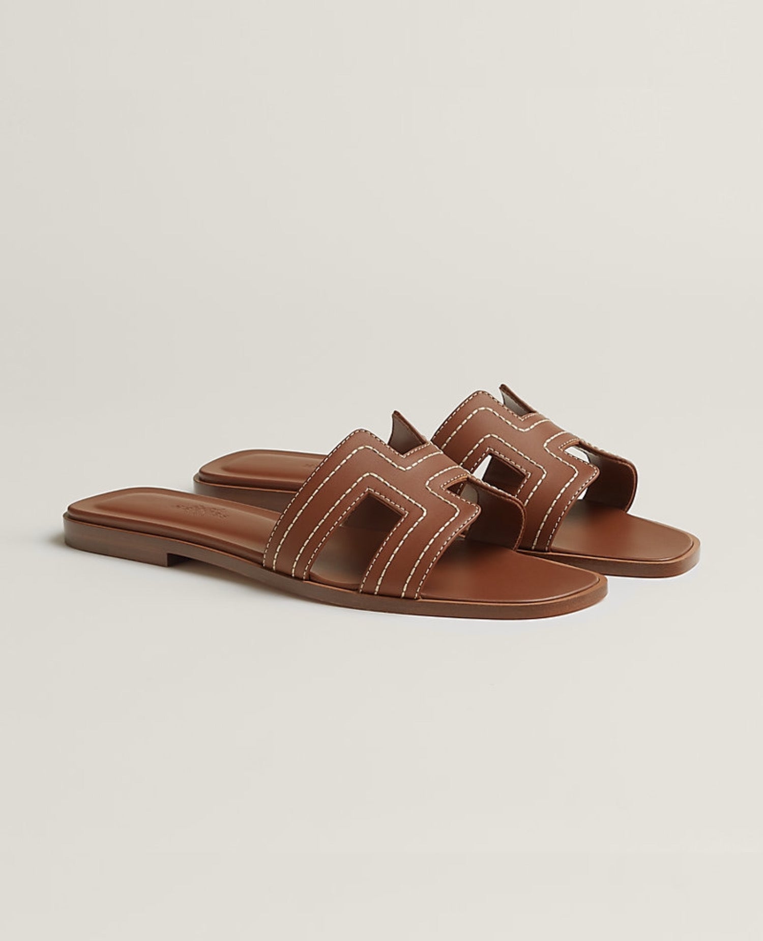 Hermès Oran Sandal Dark Gold