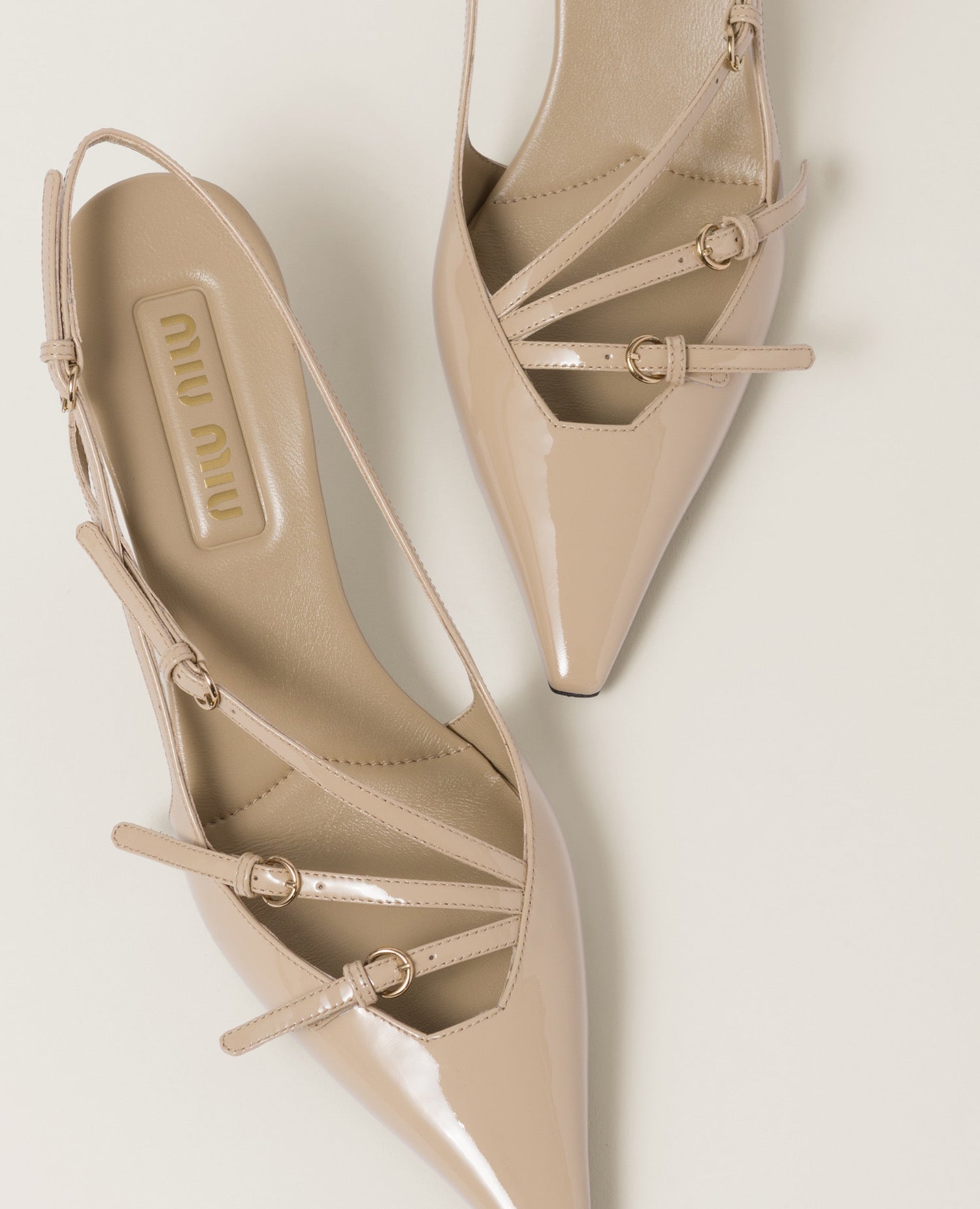 Miu Miu Patent leather slingbacks with buckles