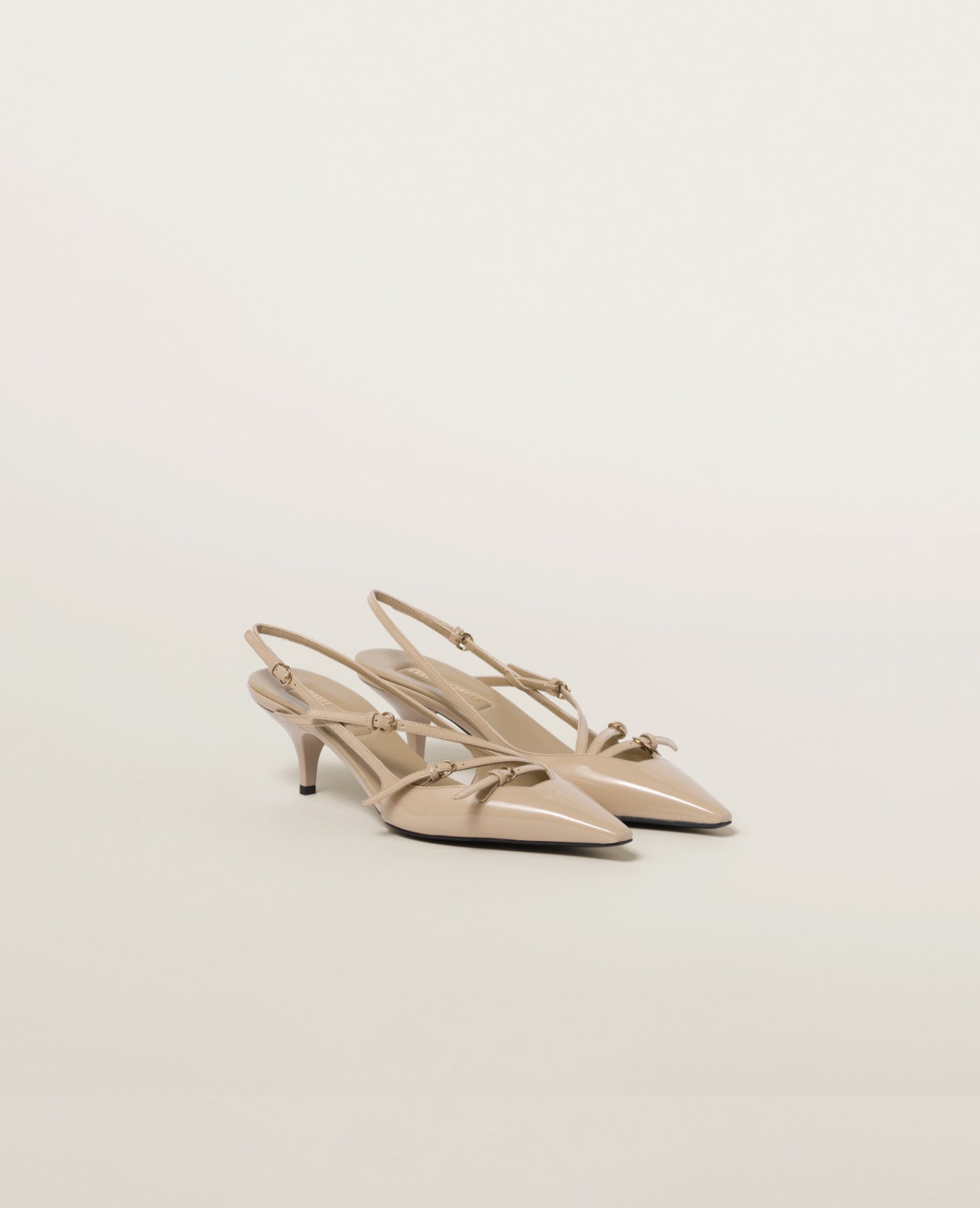 Miu Miu Patent leather slingbacks with buckles