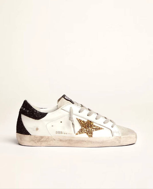 GOLDEN GOOSE
Women's Super-Star with gold star and black glitter heel tab